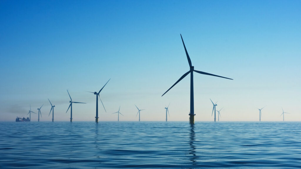 Offshore Windkraftanlage im Meer. Foto von Nicholas Doherty auf Unsplash